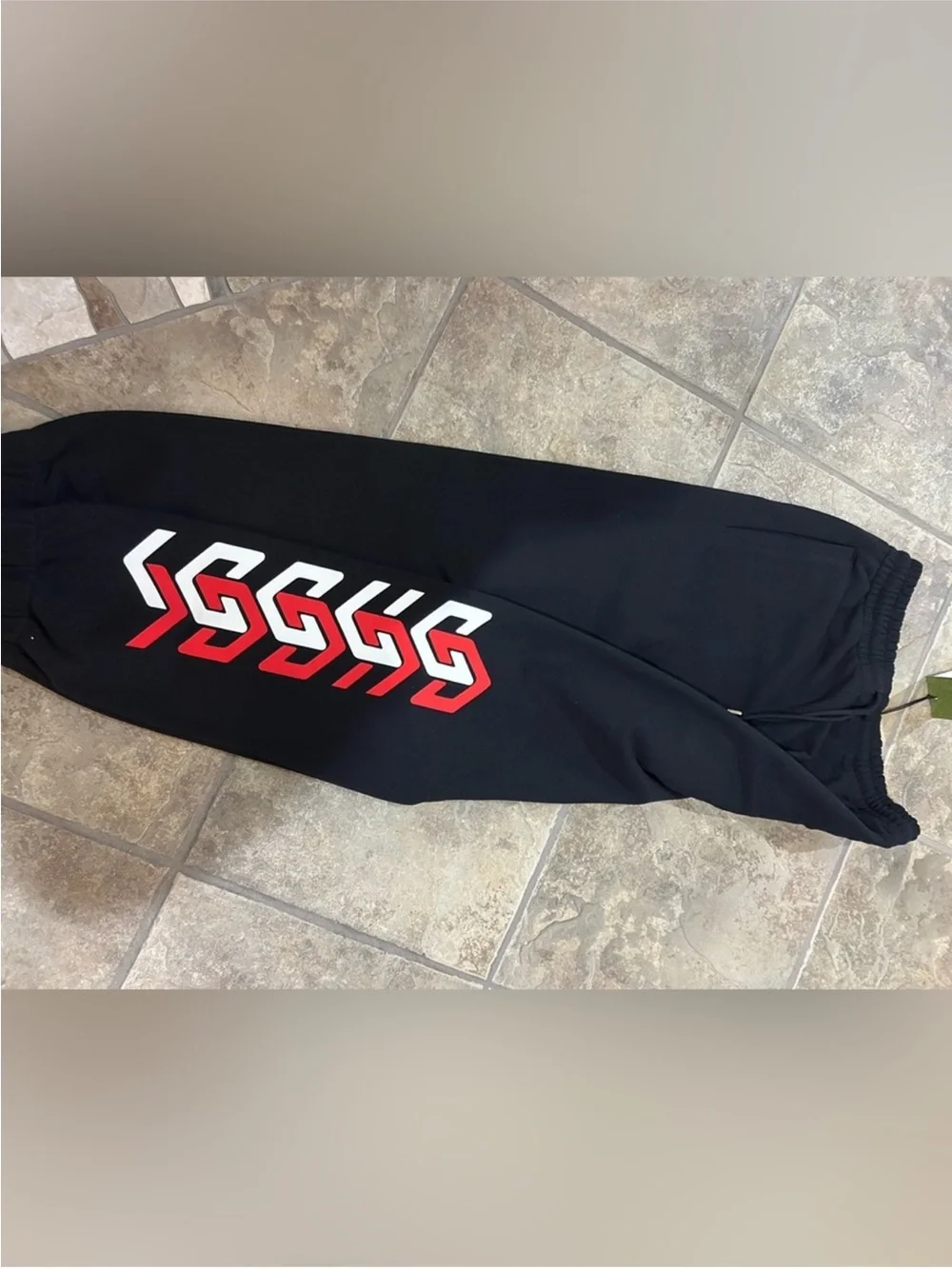 Men’s Gucci, cotton red/white logo sweatpants size XL fits small/medium NWT